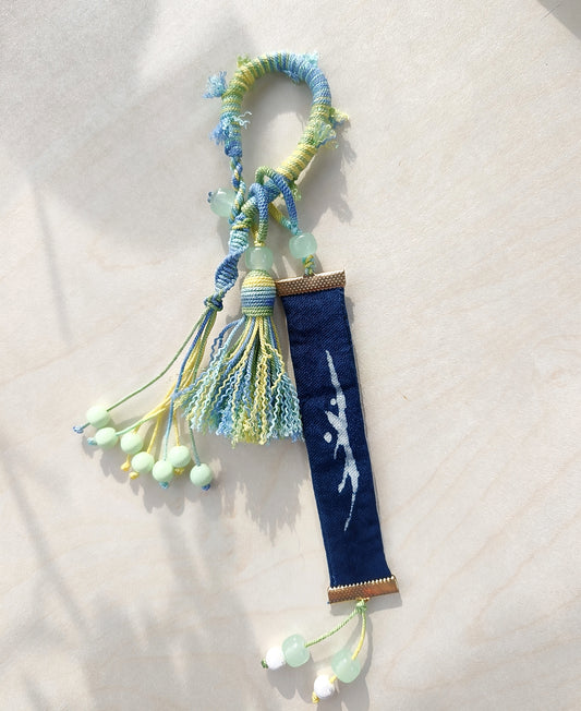 BA-15: Handmade Nüshu Batik Bag Ornament – Sunshine Character