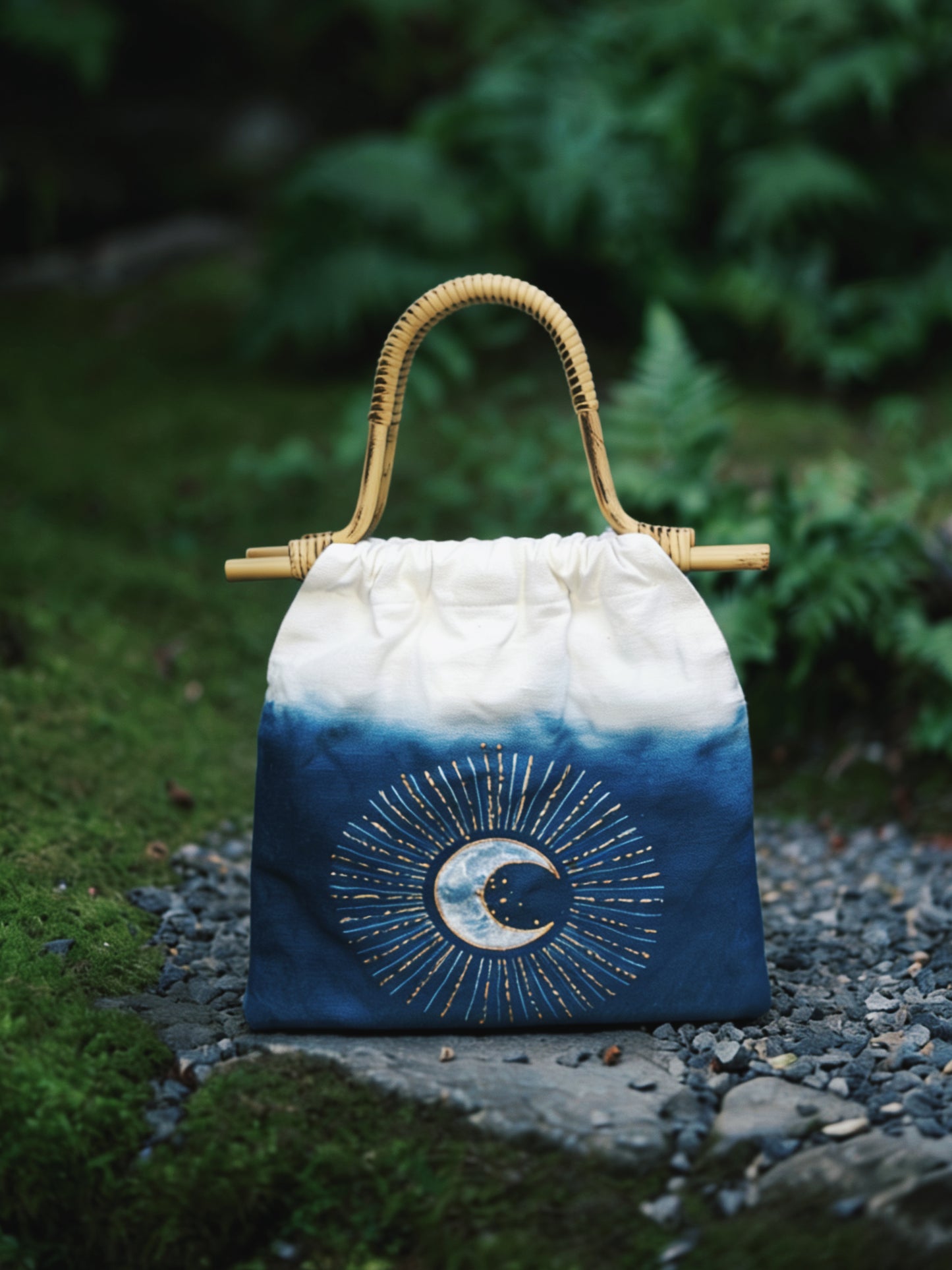 Handbag with celestial design on a natural background