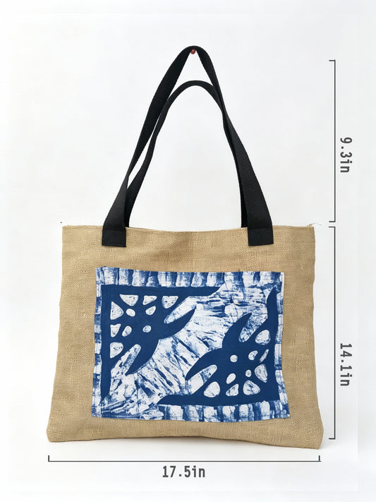 Tote bag with blue floral pattern on beige fabric, black handles, and measurements indicated.