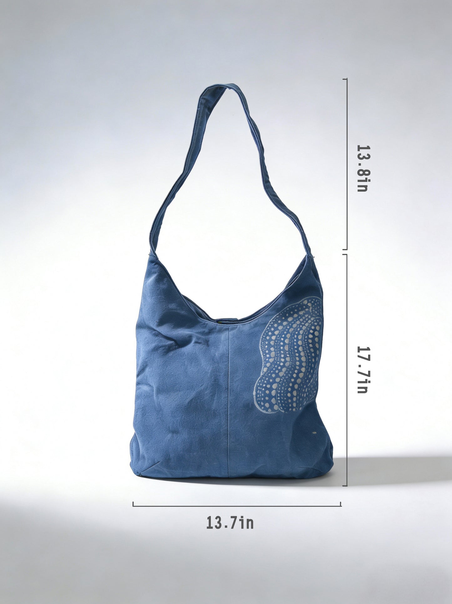 Blue handbag with measurements on a white background