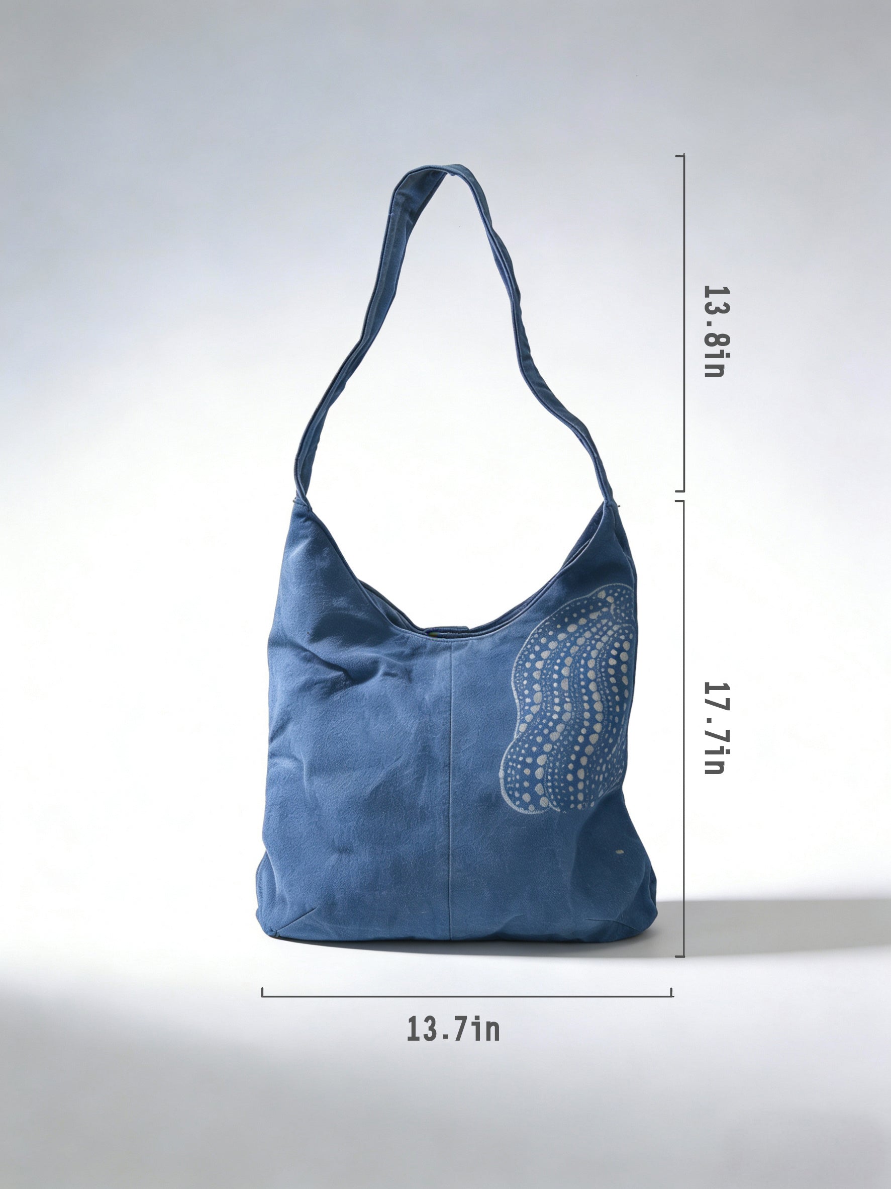 Blue handbag with measurements on a white background