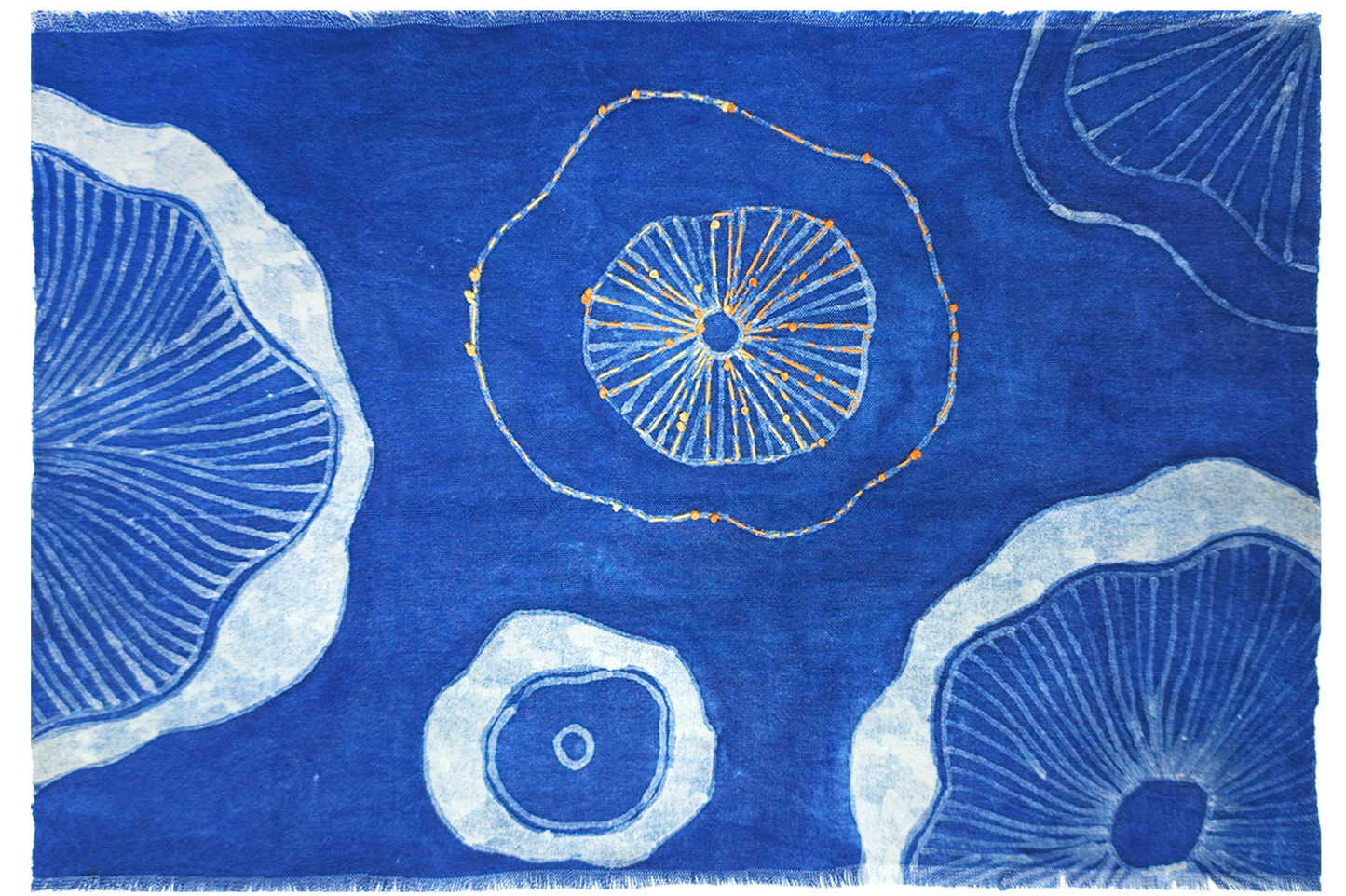 Blue rug with white abstract circular patterns