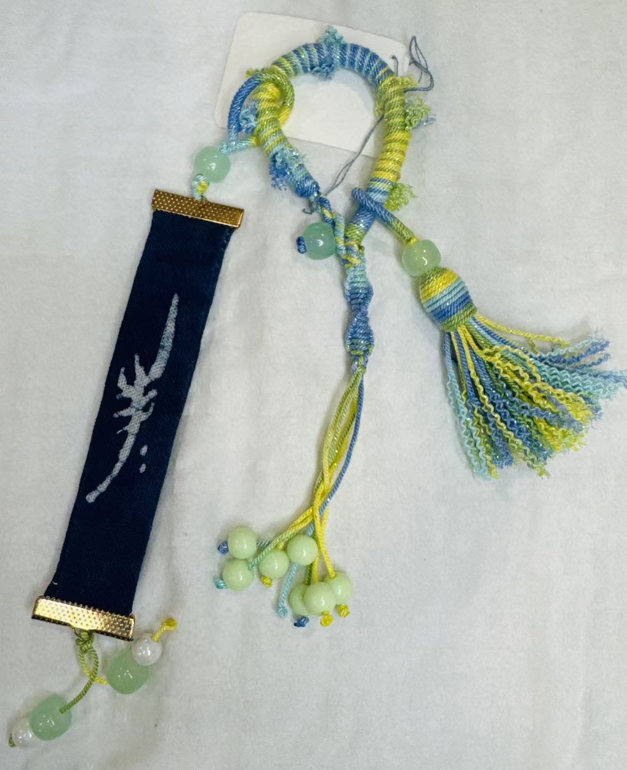 BA-15: Handmade Nüshu Batik Bag Ornament – Sunshine Character