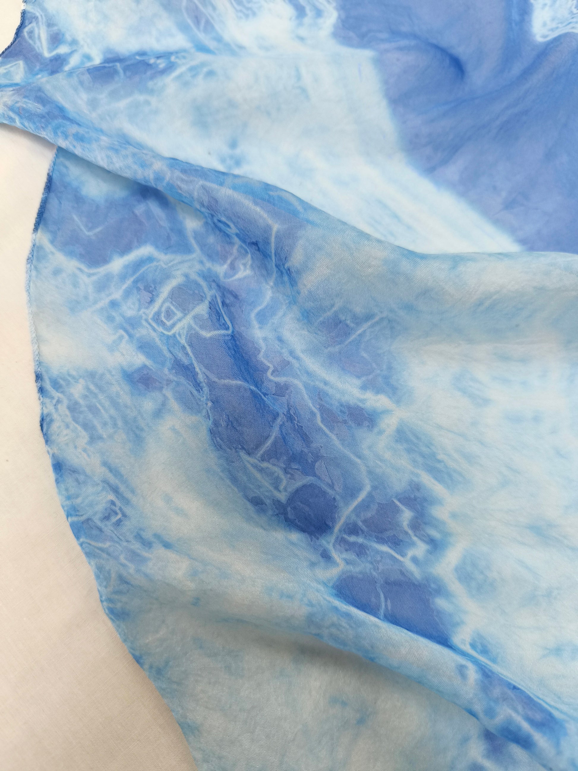 Close-up of blue and white marbled fabric