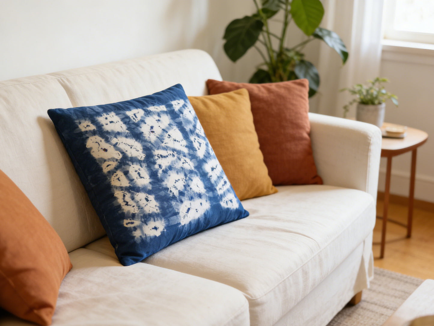 White sofa with colorful pillows in a living room setting