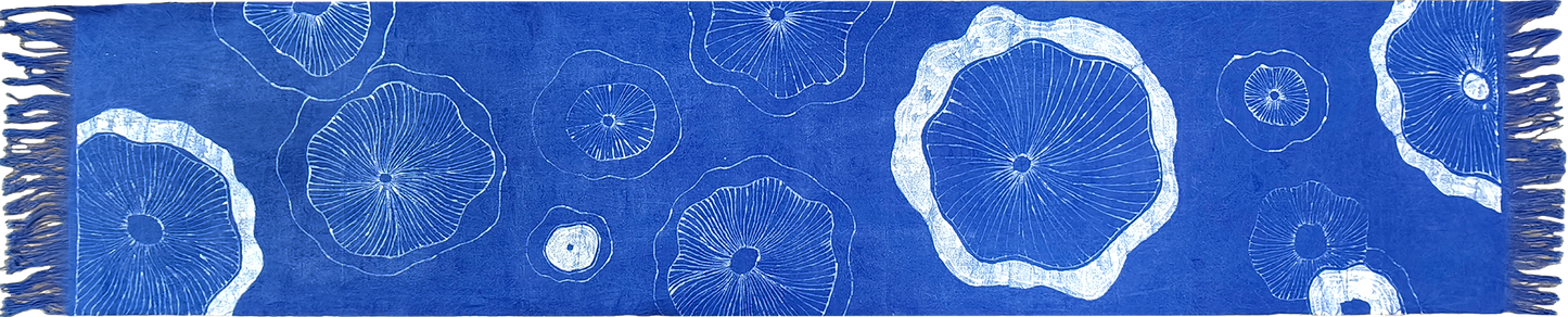Blue scarf with white circular patterns