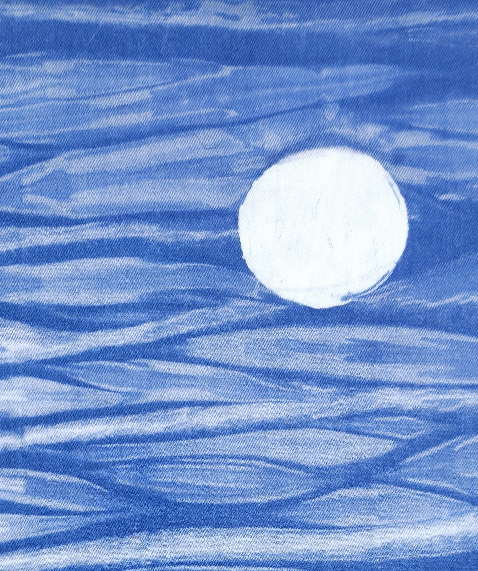 White circle on a blue textured background