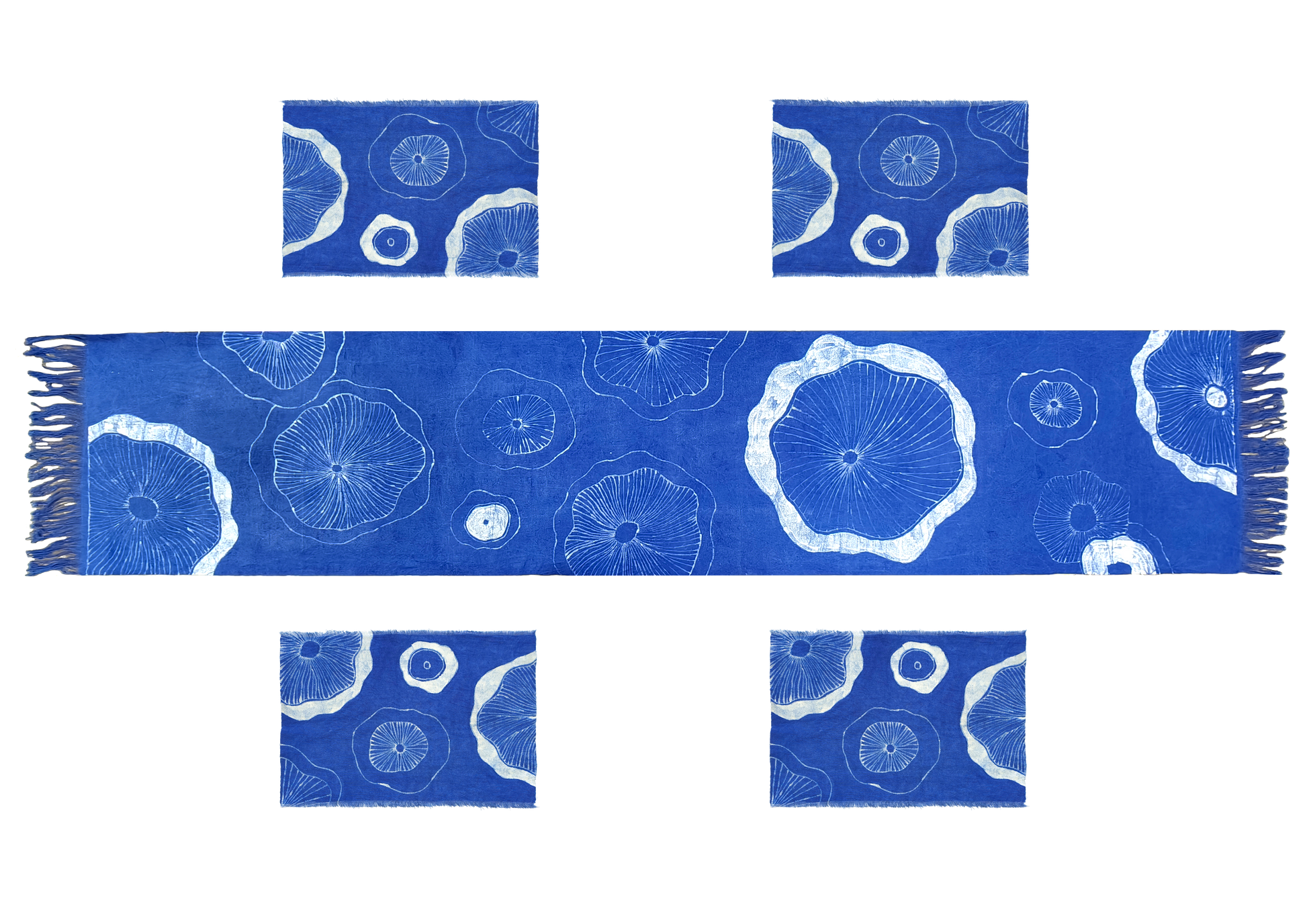 Blue scarf with white circular patterns on a white background