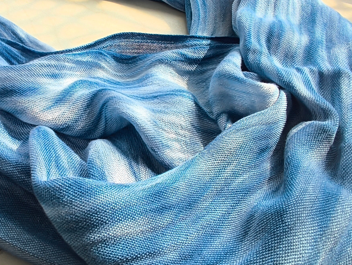 Close-up of blue fabric with a textured pattern