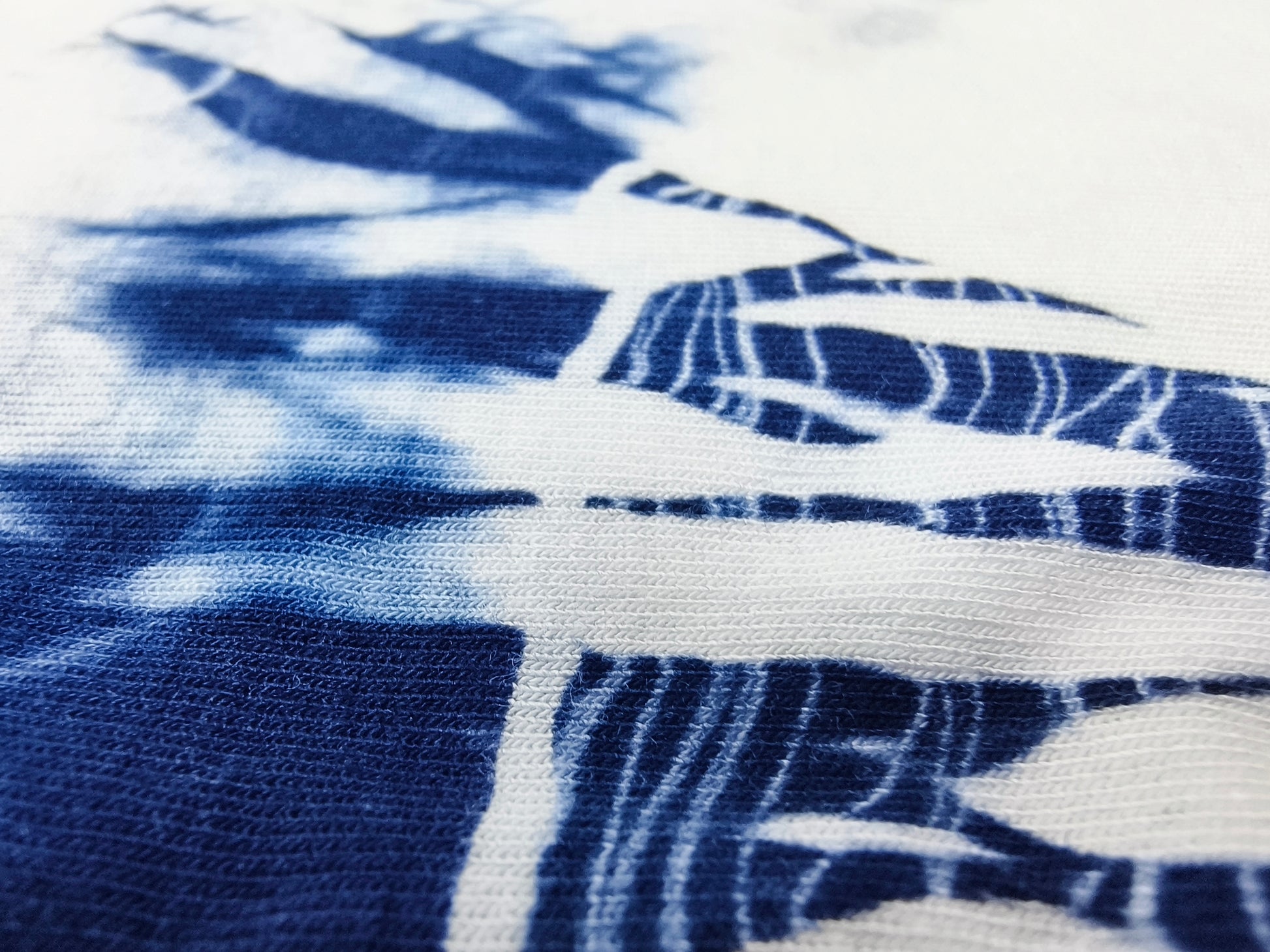 Close-up of blue and white tie-dye fabric