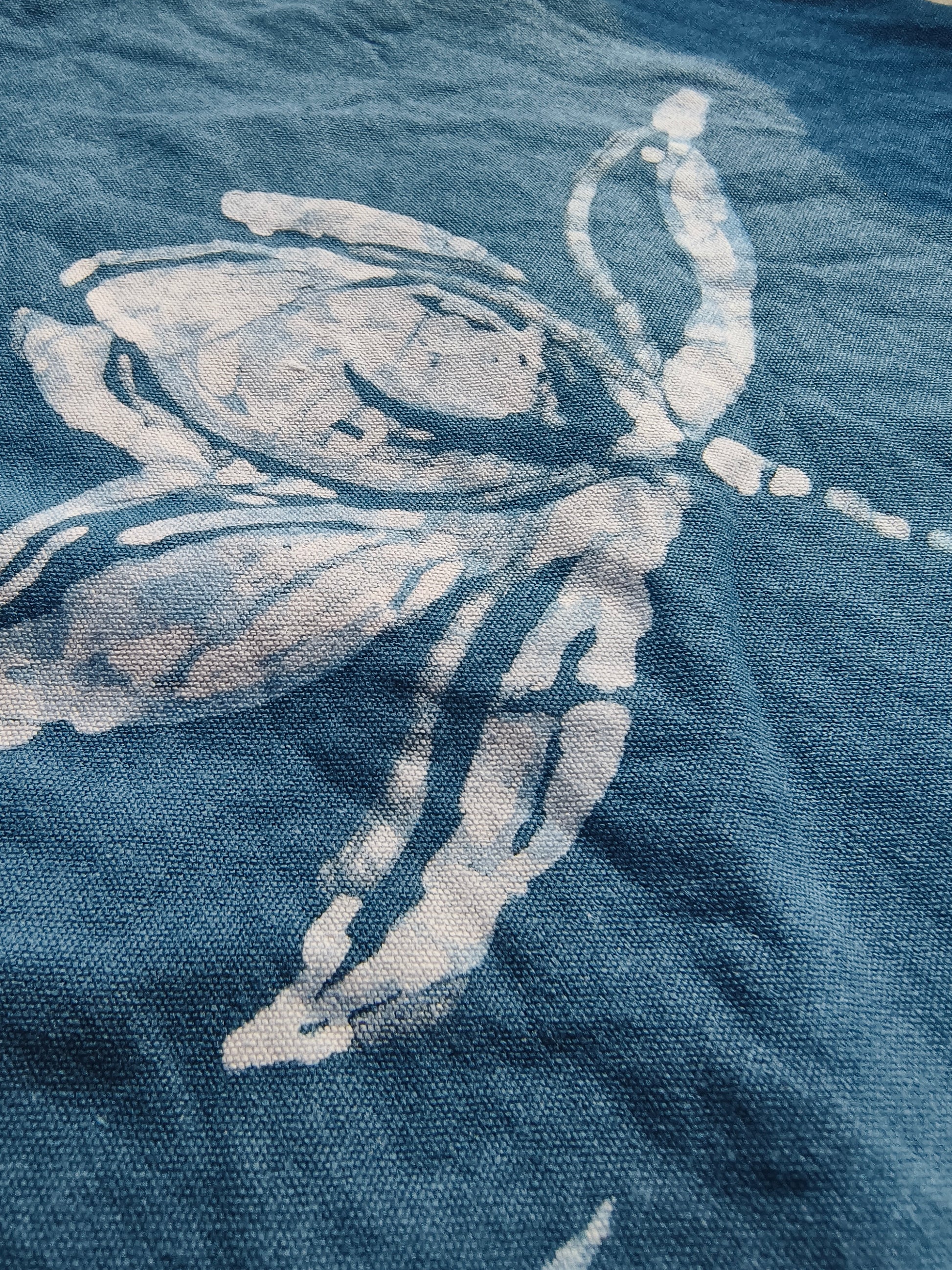 Blue fabric with white butterfly design