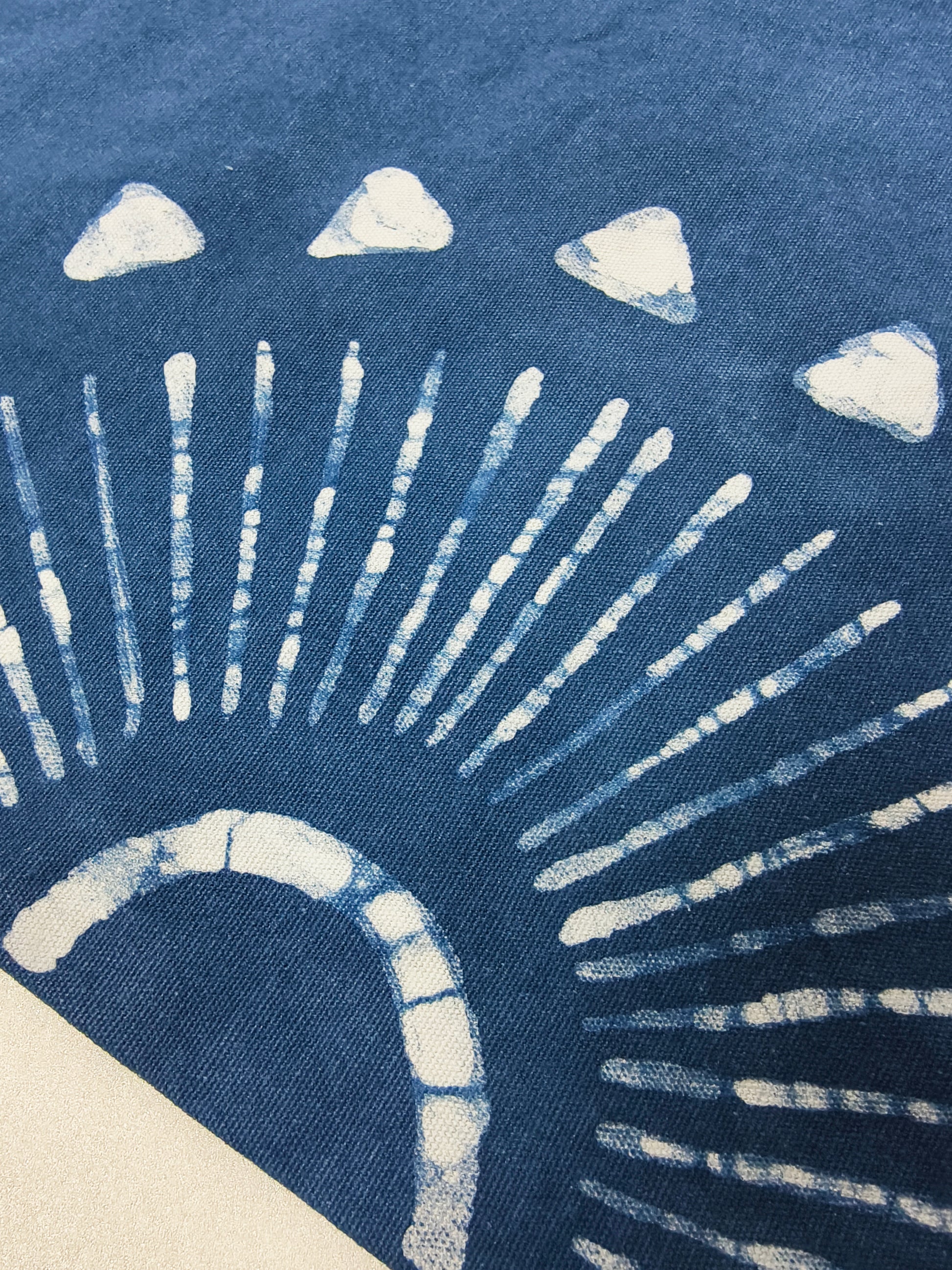 Textile with white abstract patterns on a blue background