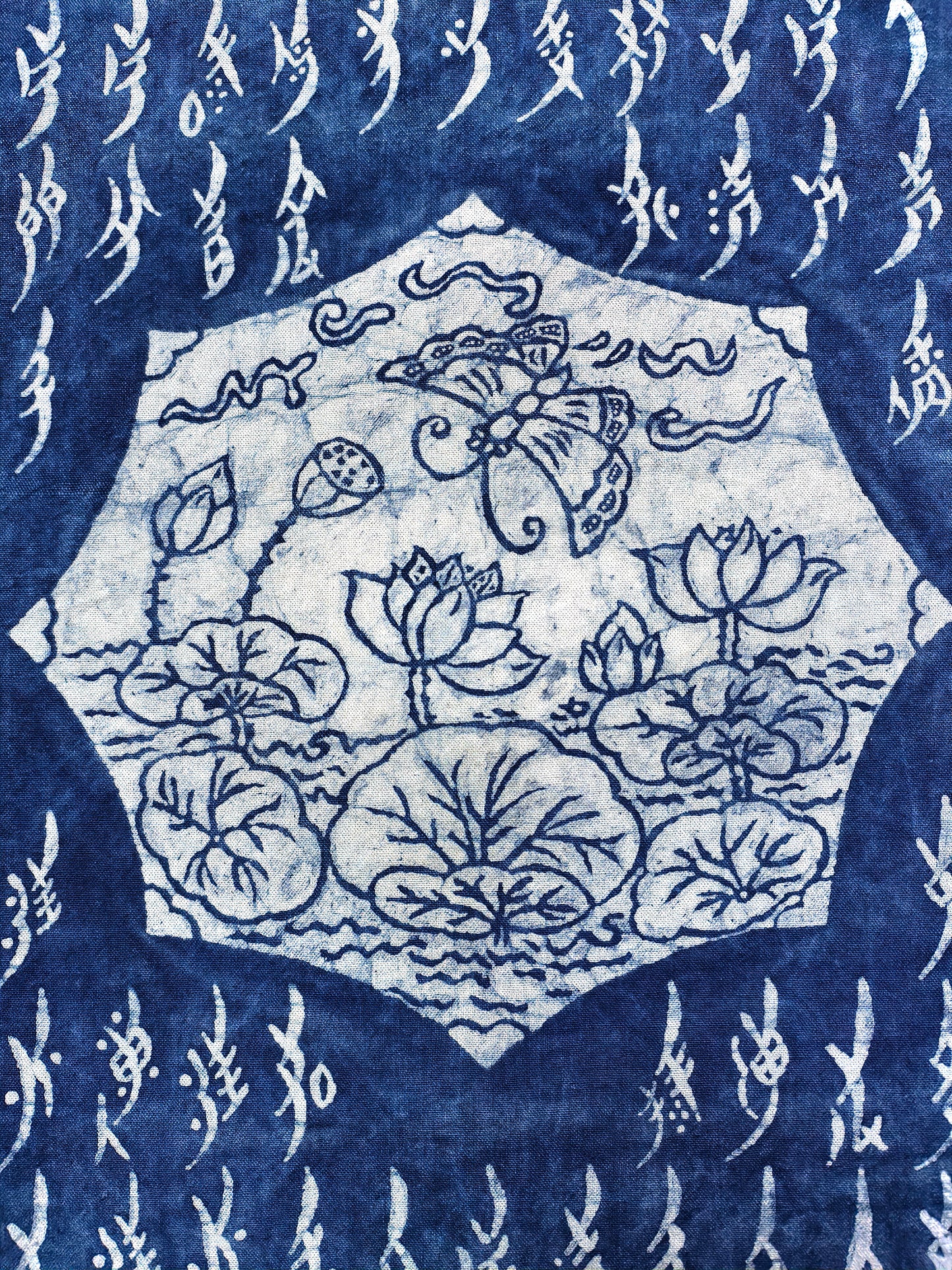 BA-03: Loving Lotus – A Nüshu Story Medium: Handmade batik on canvas Size: 18” x 38” (vertical wall hanging)